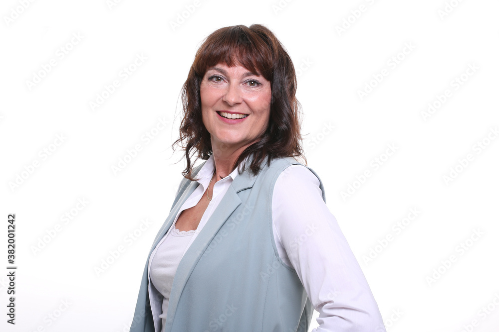 Beautiful mature woman in front of a background Beautiful mature woman in front of a background