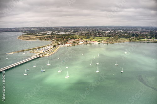 Langstone Harbour aerial photo with the road bridge and yachts in view approaching Langstone Marina.