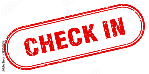 check in stamp. rounded grunge textured sign. Label