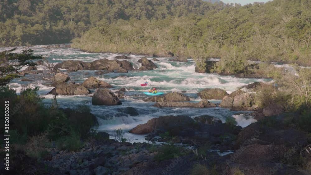 Kayakas on Petrohue falls at the surroundings of Osorno Volcano. Puerto Varas, Chile, South America. Kayakas on Petrohue falls at the surroundings of Osorno Volcano. Puerto Varas, Chile, South America.