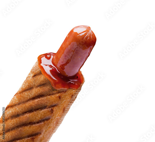 A delicious french hot dog with sauce on a white background