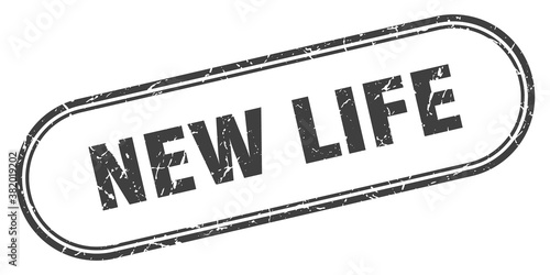 new life stamp. rounded grunge textured sign. Label