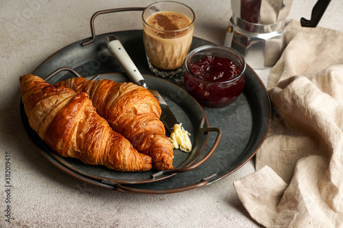 croissants with coffee and jam, tipical cotinental breakfast