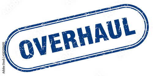 overhaul stamp. rounded grunge textured sign. Label
