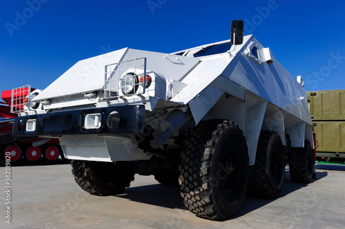 Cuadro en lienzo Armored personnel carrier or APC, white military wheeled all-terrain bulletproof