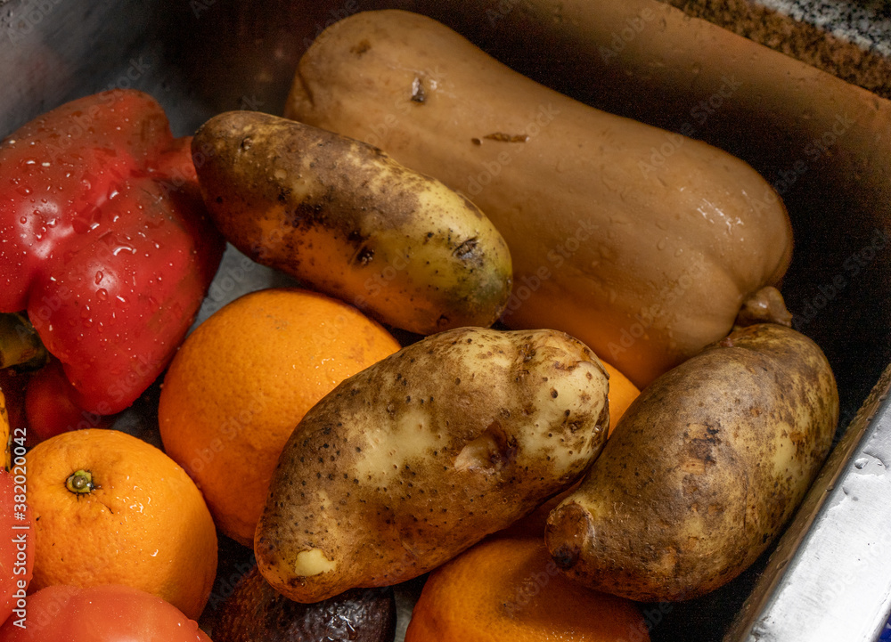 Clean fruits and vegetables in the kitchen Clean fruits and vegetables in the kitchen