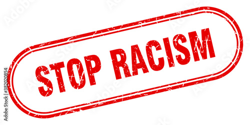 stop racism stamp. rounded grunge textured sign. Label