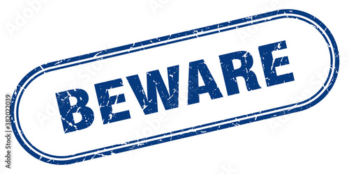 beware stamp. rounded grunge textured sign. Label