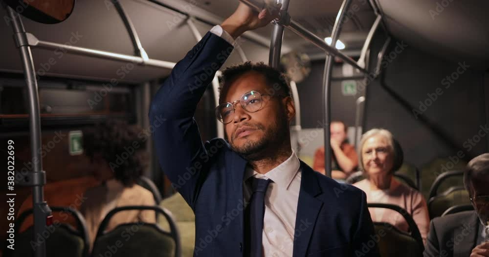 Tired african-american business man on public bus Tired african-american business man on public bus