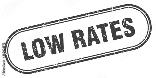 low rates stamp. rounded grunge textured sign. Label