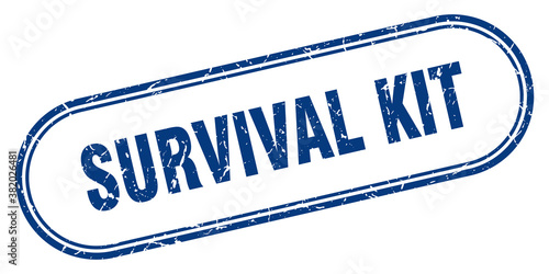 survival kit stamp. rounded grunge textured sign. Label