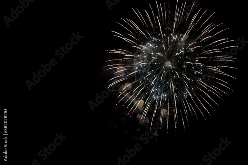 Fireworks display with copy space on left side.