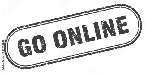 go online stamp. rounded grunge textured sign. Label
