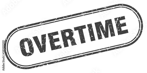 overtime stamp. rounded grunge textured sign. Label