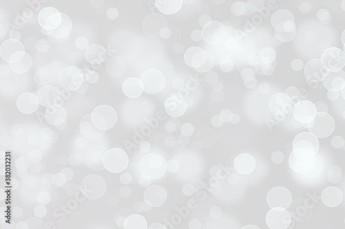 Bokeh pattern in beige with circular shapes and white colour.