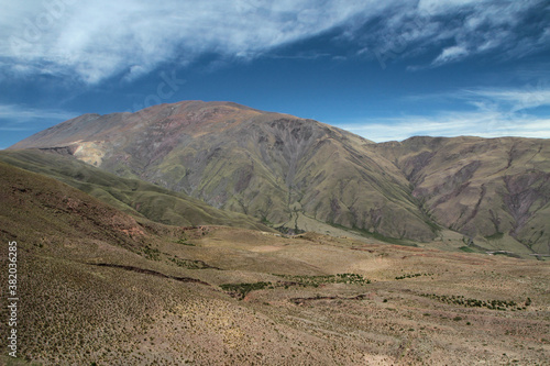 Popular landmark Bishop's slope in Salta, Argentina. Aerial view of the green field, valley and mountains.