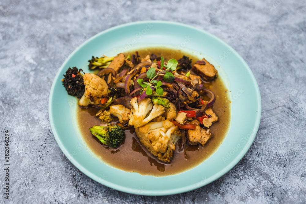 plant-based food, vegan mixed vegetable stew with tempeh plant-based food, vegan mixed vegetable stew with tempeh