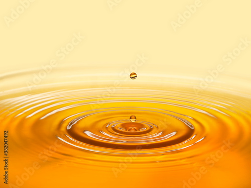 golden oil drop with ripples vegetable, organic, olive, sunflower oil, pure, wellness, and beauty products