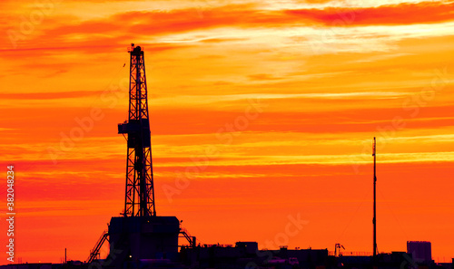 The drilling rig during sunset