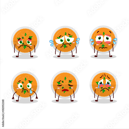 Mashed orange potatoes cartoon character with sad expression