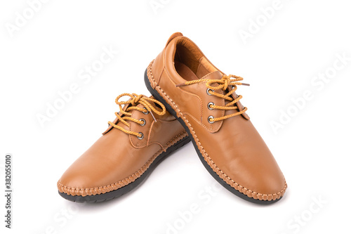 New brown men leather shoes. Studio shot isolated on white © SKT Studio