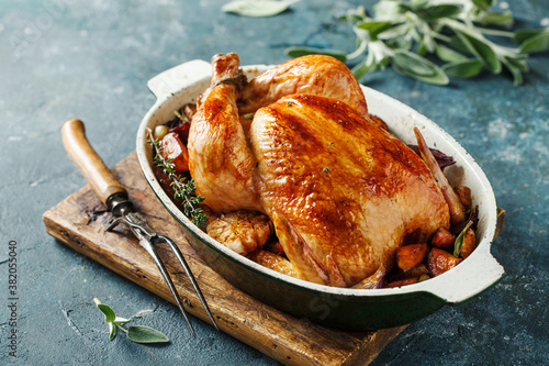 Whole roasted chicken with vegetables