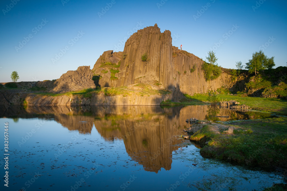 rocky monument reflection in the lake, czech swiss, czech republic