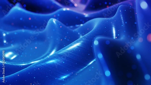 Stylish abstract blue surface as fantastical festive bg. Looped background, waves move on glossy surface like landscape made of liquid blue wax with sparkles. Beautiful soft bg with smooth animatin 4k photo