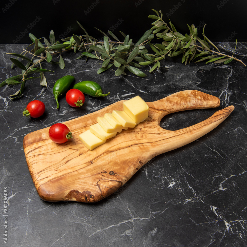 wooden cheese board with snacks wooden cheese board with snacks