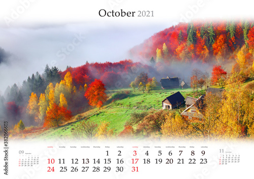 Calendar October 2021, B3 size. Set of calendars with amazing landscapes. Fabulous autumn scene of mountain village. Foggy morning in Carpathian mountains. Sokilsky ridge, Ukraine, Europe. photo