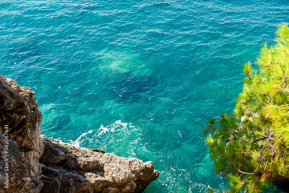 Lagoon of turquoise water near Sveti Stefan, Montenegro.