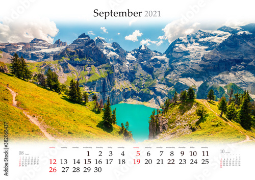 Calendar September 2021, B3 size. Set of calendars with amazing landscapes. Colorful autumn view of unique Oeschinensee Lake. Splendid outdoor scene of Swiss Alps.