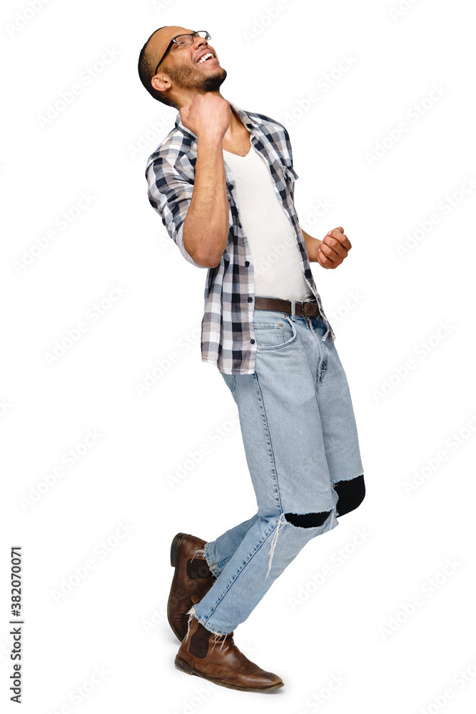Young African-American man yes win gesturing over white background Young African-American man yes win gesturing over white background