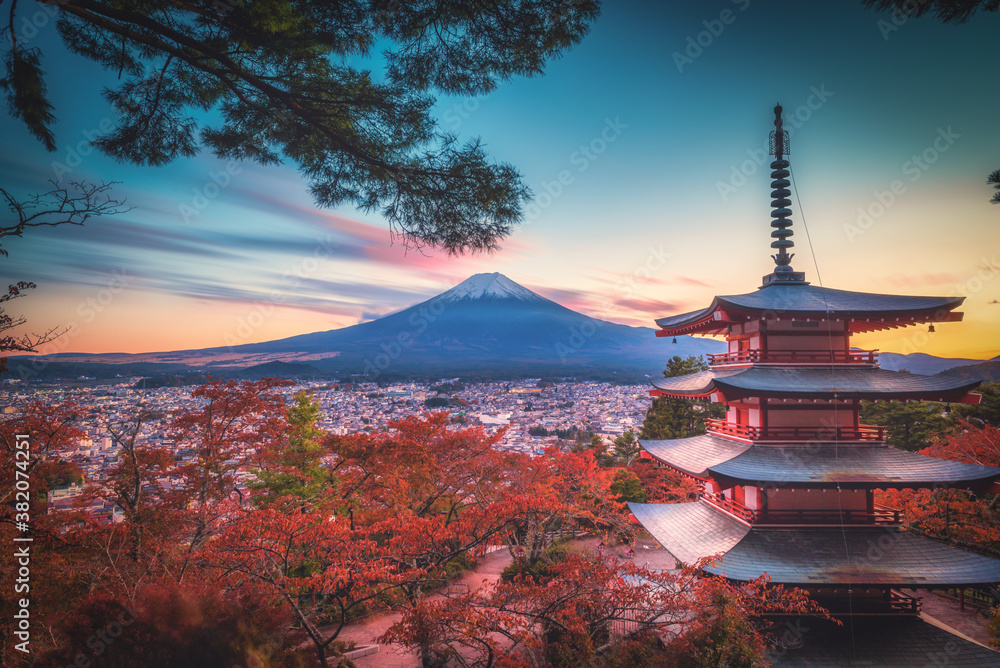 Fototapeta Mt. Fuji with Chureito Pagoda and red leaf in the autumn on sunset at Fujiyoshida, Japan.