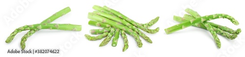 Fresh sprouts of asparagus isolated on white background. Set or collection