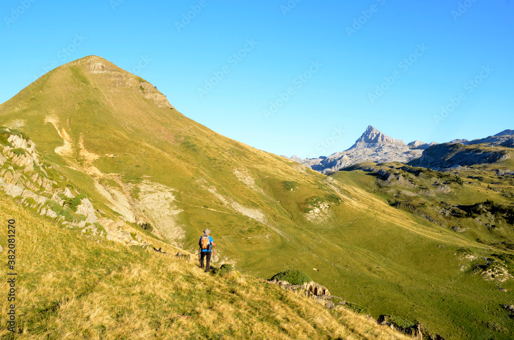 Hiker heading to Mount Anie, Pyrenees, France