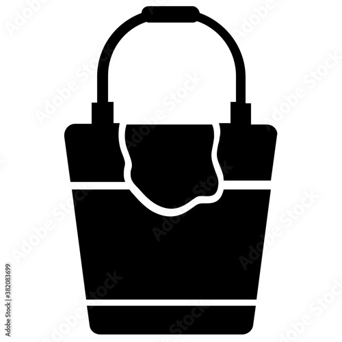 
A hand-held bag with handles to grip symboling handbag 
