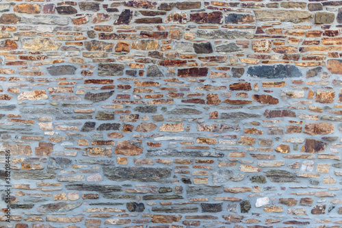 Large stone wall masonery, texture background, belgium, europe photo