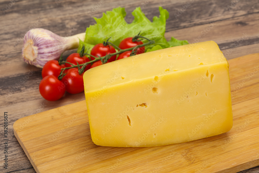 Hard yellow tasty cheese brick Hard yellow tasty cheese brick