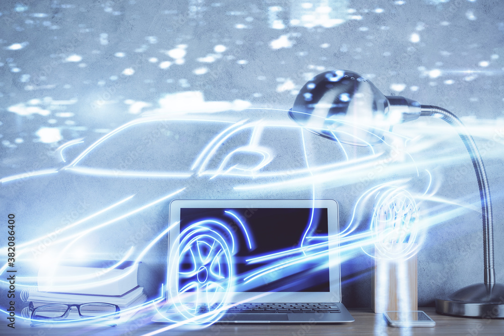 Naklejka premium Desktop computer background in office with automobile hologram drawing. Multi exposure. Tech concept.