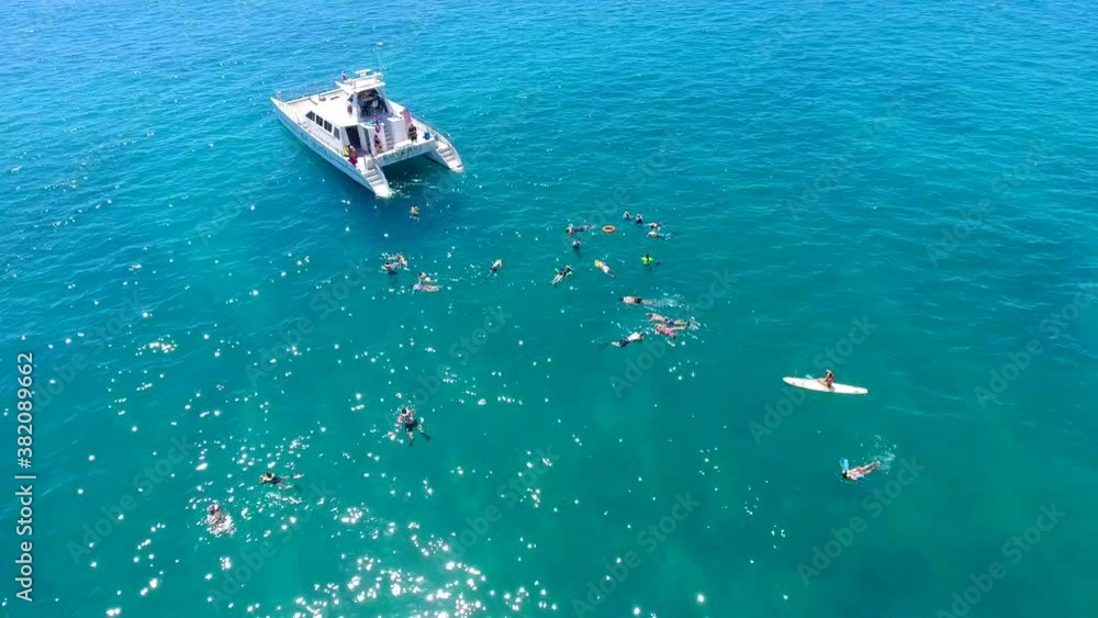 Aerial Kahe Point Oahu Hawaii,People snorkeling by boat Aerial Kahe Point Oahu Hawaii,People snorkeling by boat