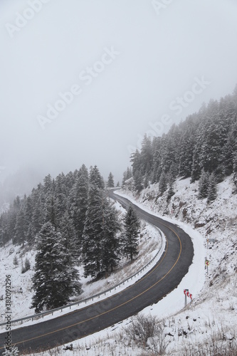 Snowy bending road scene in winter. artvin © murat