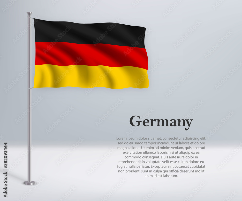 Fototapeta premium Waving flag of Germany on flagpole. Template for independence day
