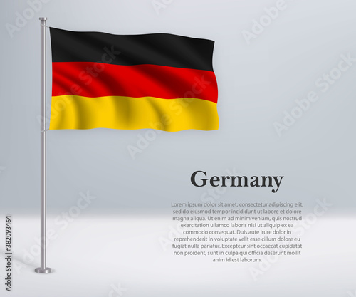 Waving flag of Germany on flagpole. Template for independence day