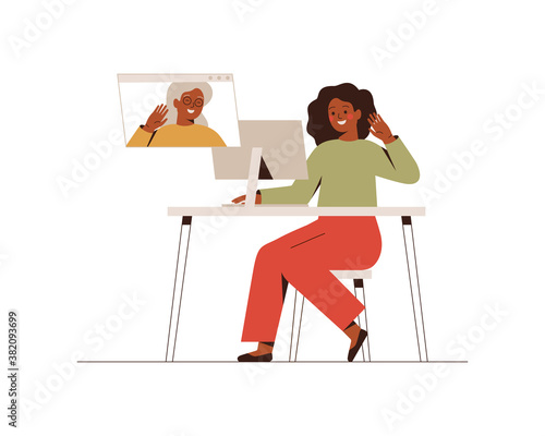 Young black woman has a video call with her mature mother. Happy daughter makes online conversation with her grandmother at the computer. Family web communication. Vector illustration