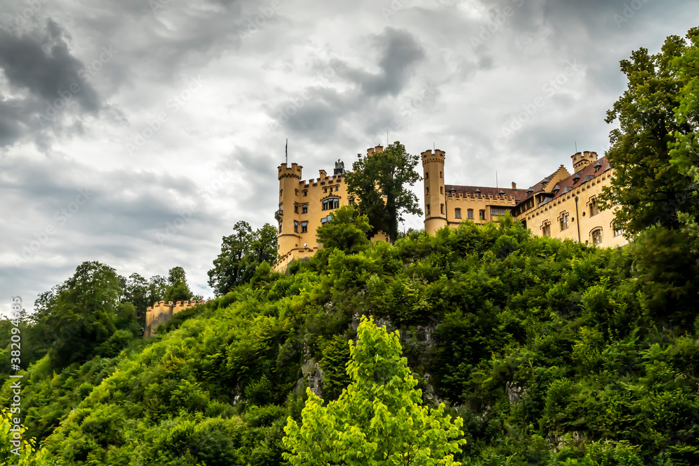 The castle Hohenschwangau in Füssen, Bavaria, Germany at a cloudy day in summer.