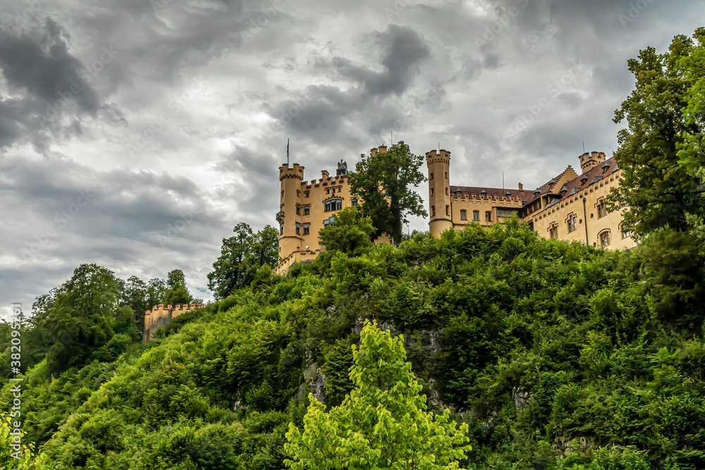 The castle Hohenschwangau in Füssen, Bavaria, Germany at a cloudy day in summer.