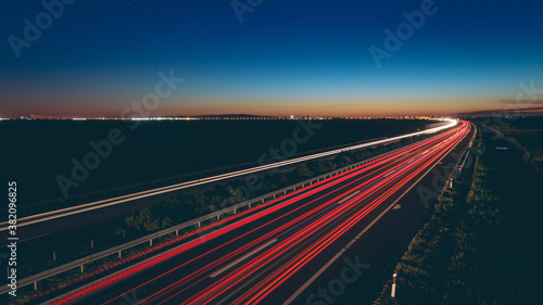 Billede på lærred Beautiful view of transportation lights on the road at night time