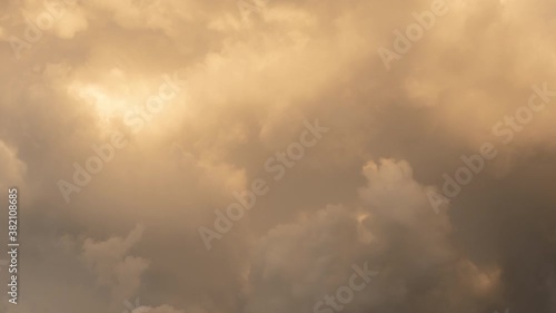 Sky with dark storm clouds. Footage B Roll Timelapse sky and orange clouds motion flow and growing. Formation of clouds before the storm.