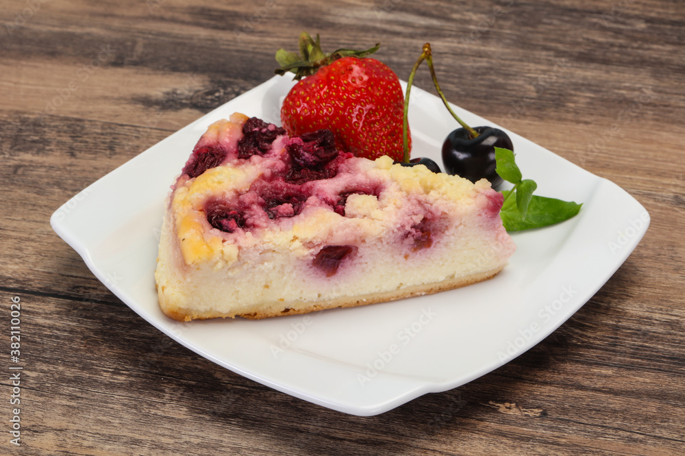 Cheesecake with cherry served strawberry Cheesecake with cherry served strawberry